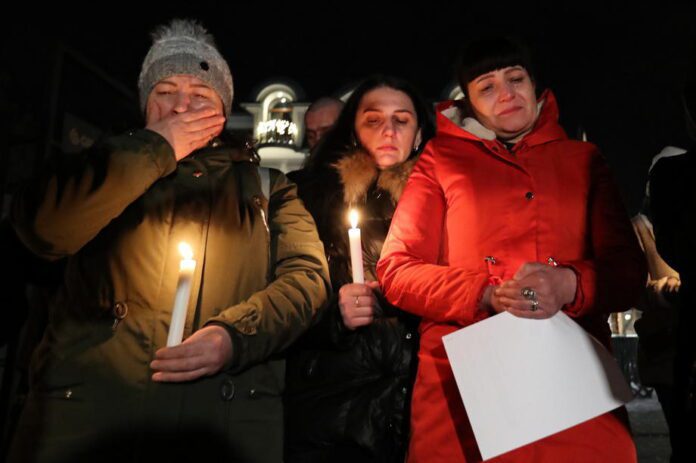 Lenkai meldžiasi už ukrainiečius / EPA nuotr.