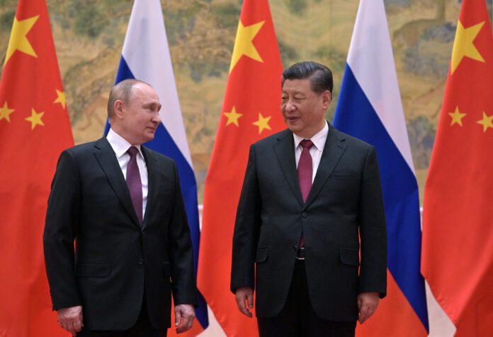 Rusijos prezidentas Vladimiras Putinas ir Kinijos vadovas Xi Jinpingas / EPA nuotr.