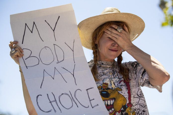 Aktyvistė už abortus JAV / EPA nuotr.