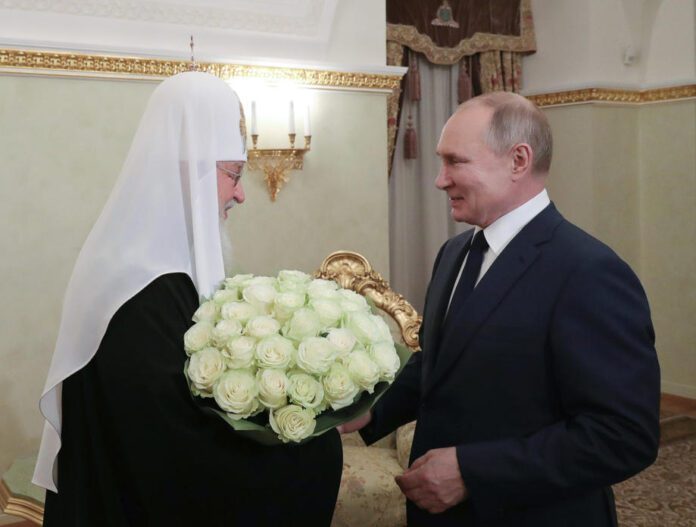 Rusijos prezidentas Vladimiras Putinas ir patriarchas Kirilas / EPA nuotr.