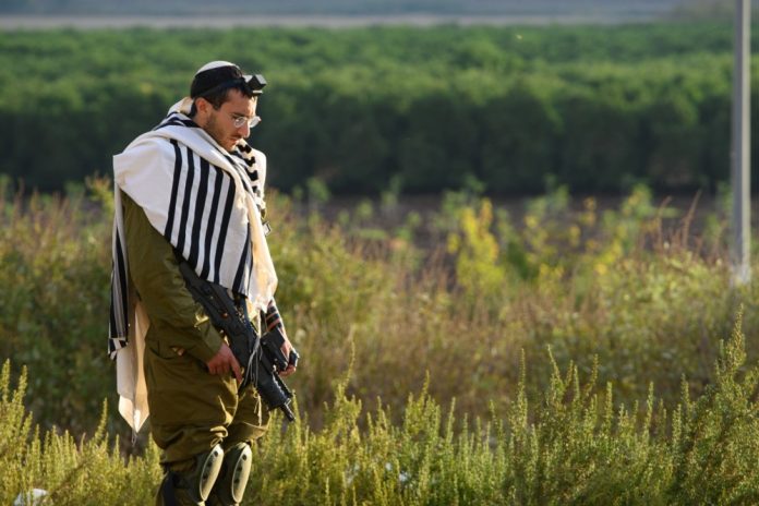 Izraelio kario malda / EPA nuotr.